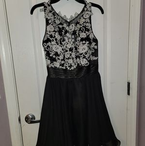 Large Formal Black Dress With White Lace